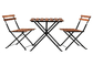 Un Tableau et deux chaises ont placé le pliage en bois de cadre en métal de dessus de jardin extérieur
